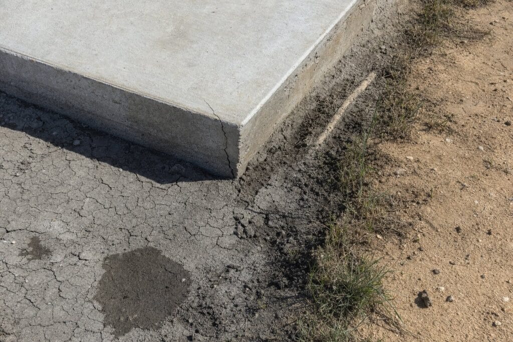 Bastrop's soil line: slab leaks vs. yard-line breaks